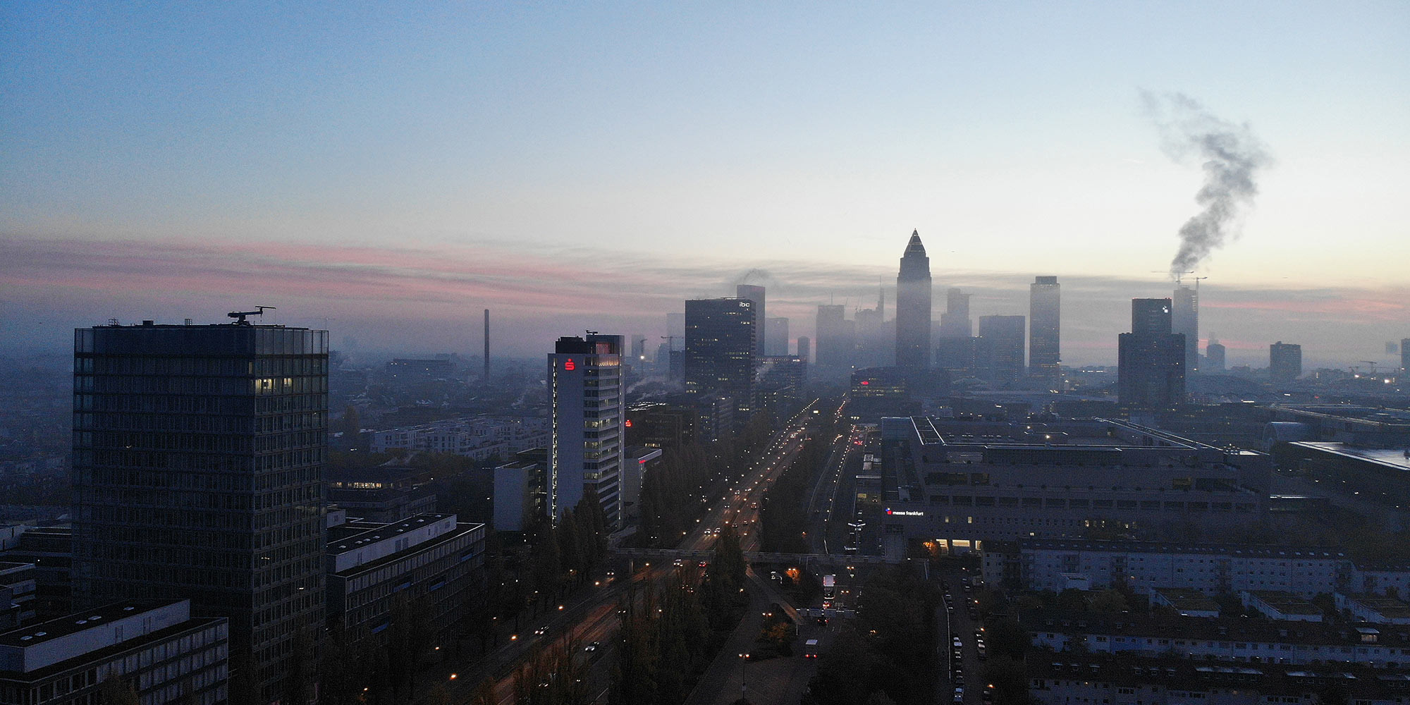 Frankfurt City West - skyline panorama of Bockenheim and Downtown Frankfurt - sunrise over the cityscape - drone image