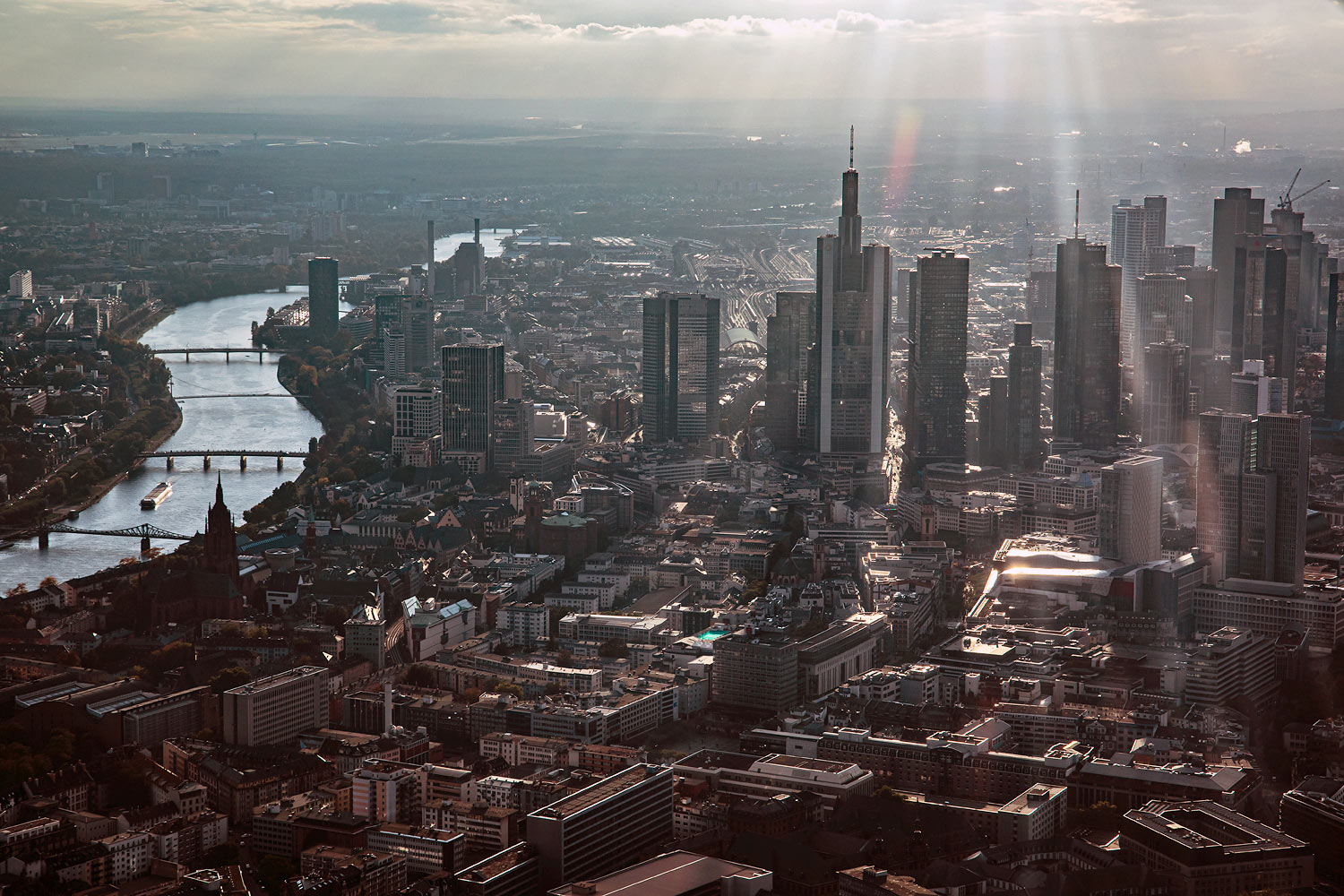 Skyline Flight Frankfurt - Flying with an air plane over the Downtown Frankfurt area and its skyscrapers