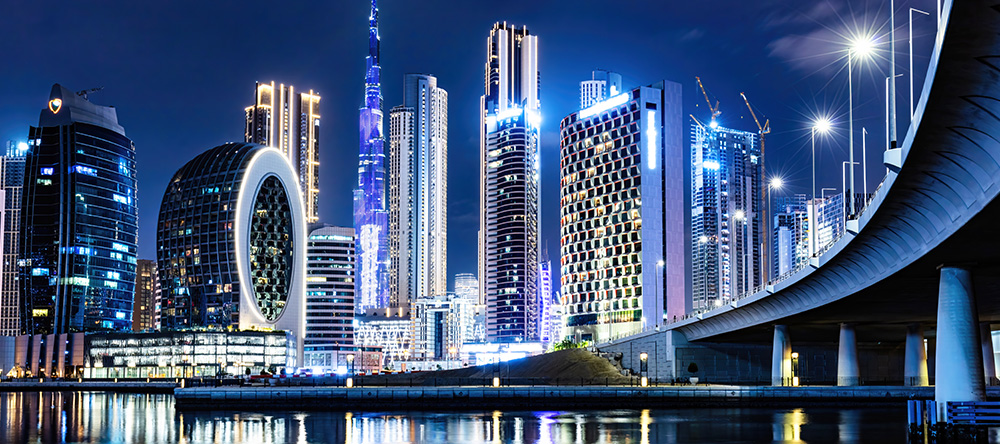 Modern skyline that lights up the streets.